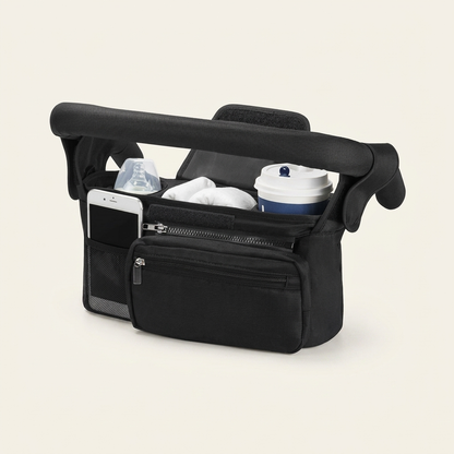 Black car organizer with items including a cup, phone, and baby bottle on a beige background